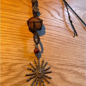 stone tassel w. charms!